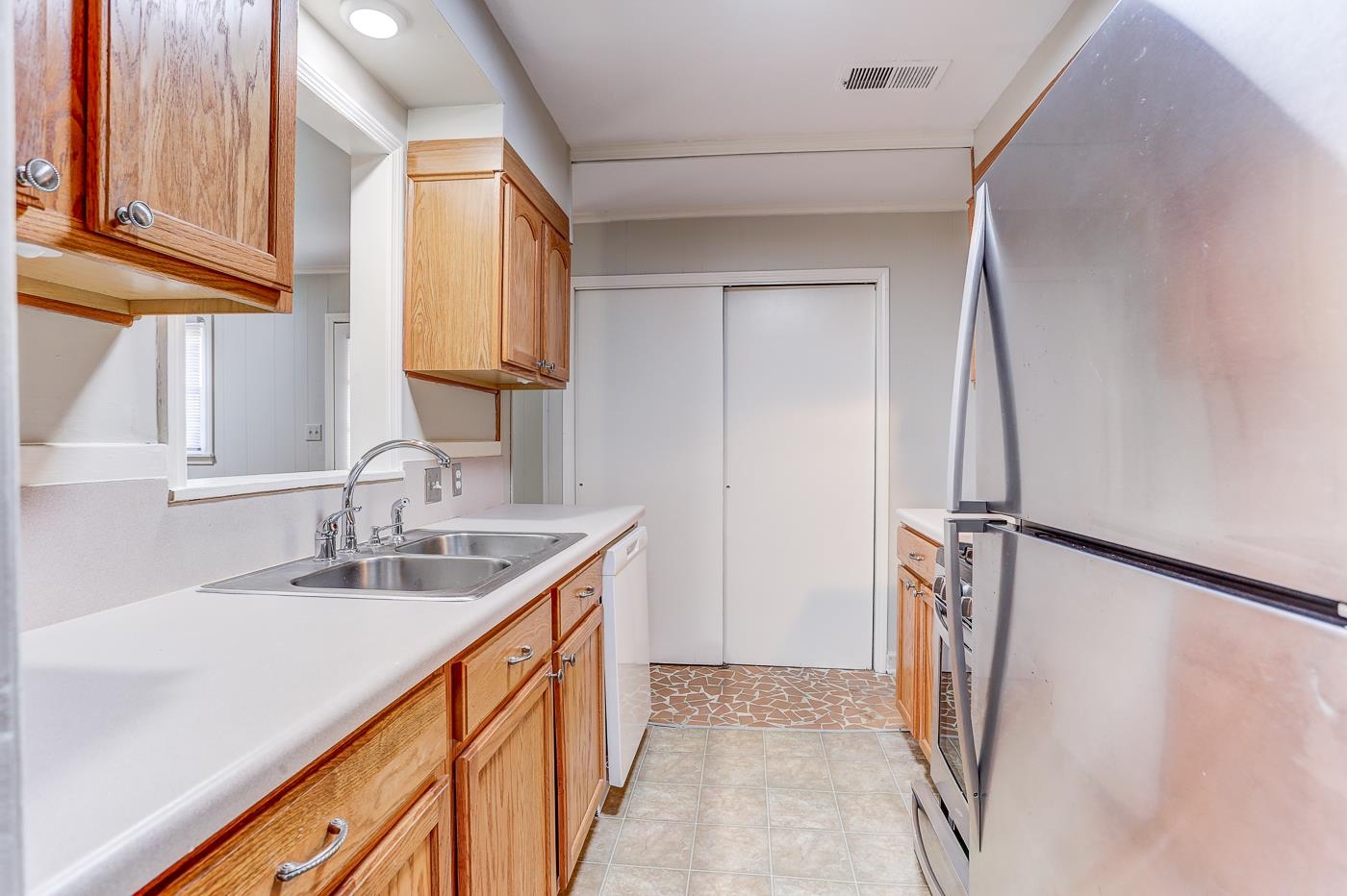 1369 Marcia Road Memphis, TN 38117 - Photo 11 of 25 a bathroom with a sink and a mirror