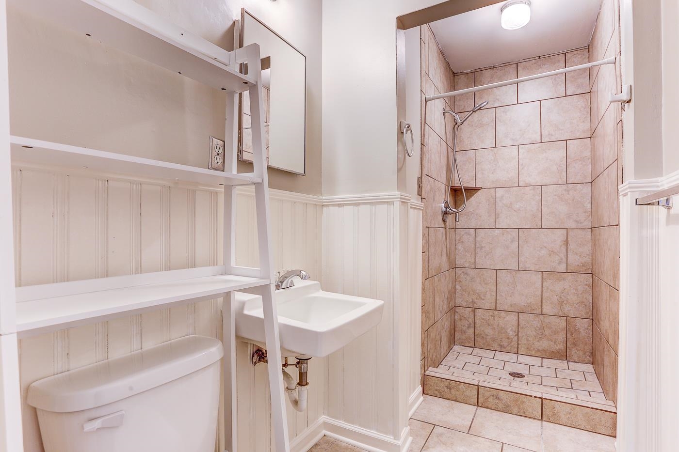 1369 Marcia Road Memphis, TN 38117 - Photo 13 of 25 a bathroom with a shower