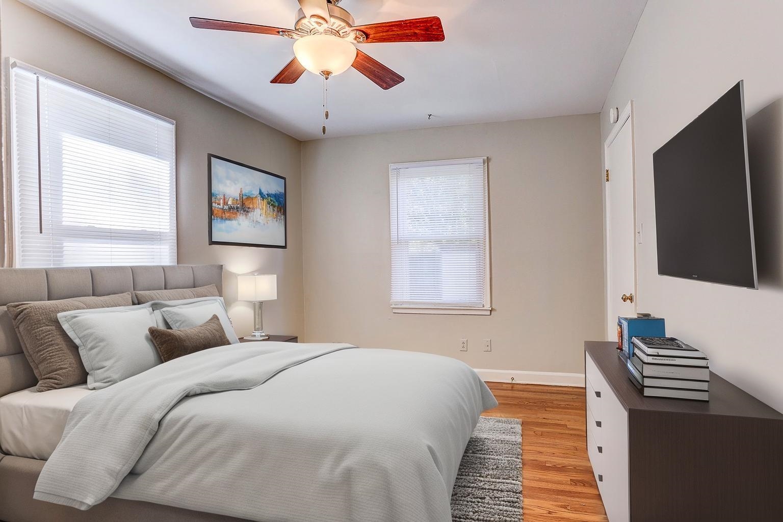 1369 Marcia Road Memphis, TN 38117 - Photo 18 of 25 a bedroom with a bed and a flat screen tv