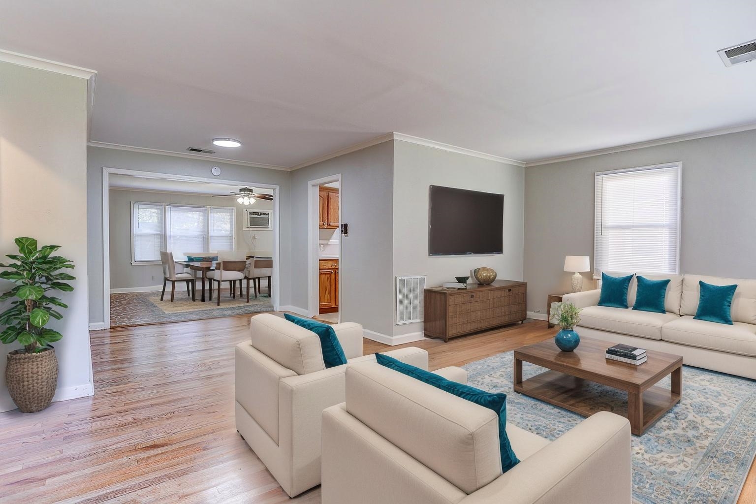 1369 Marcia Road Memphis, TN 38117 - Photo 22 of 25 a living room with furniture and a flat screen tv