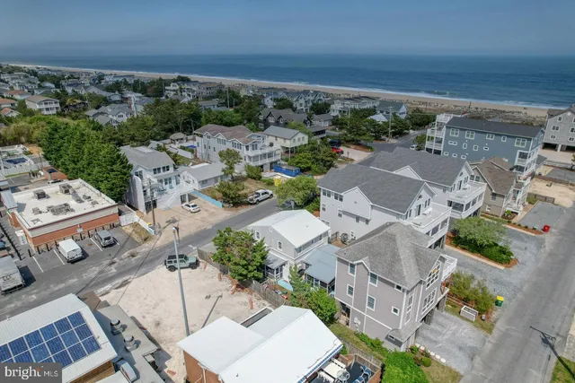 an aerial view of a house with outdoor space