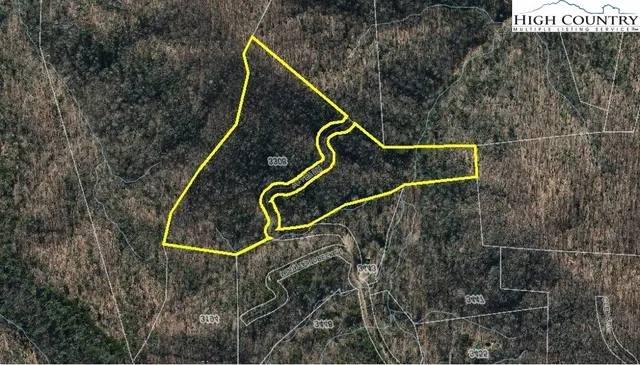 a view of a backyard of the house