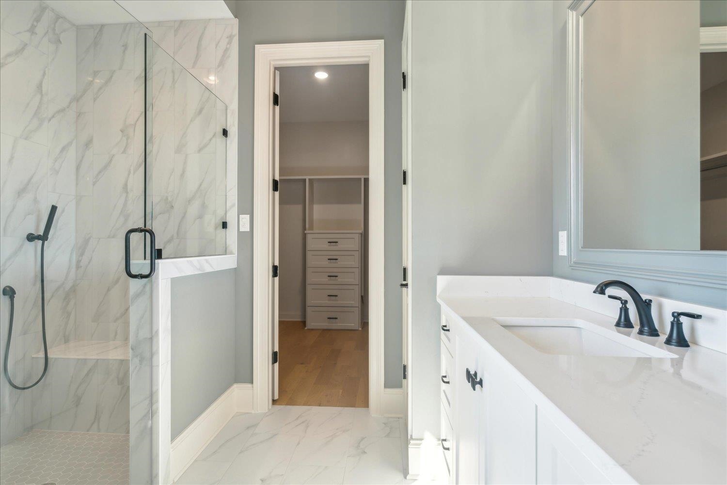 12620 Miss Cloud Road Collierville, TN 38017 - Photo 23 of 38 Bathroom featuring vanity and a shower with shower door