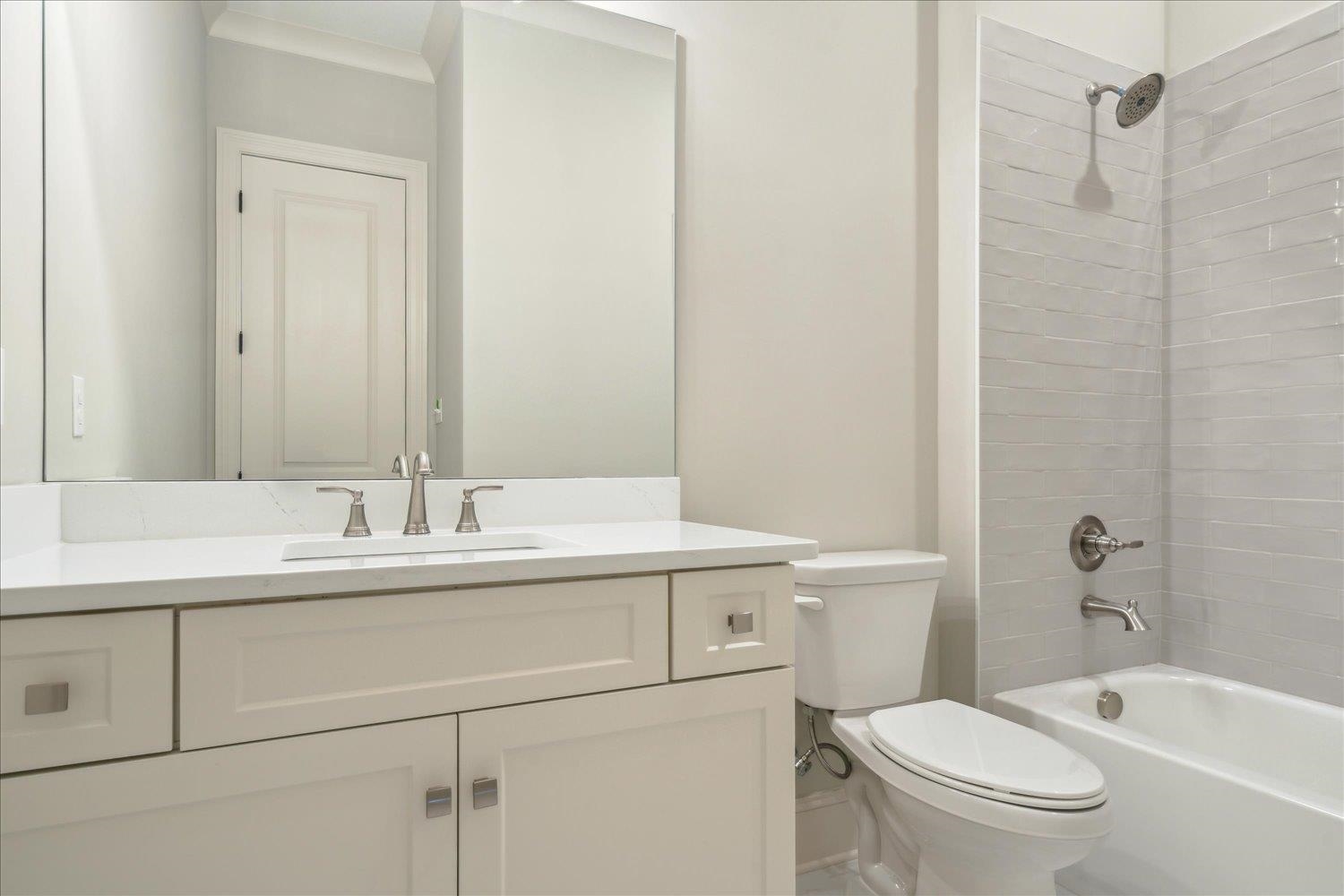 12620 Miss Cloud Road Collierville, TN 38017 - Photo 27 of 38 Full bathroom featuring toilet, tub / shower combination, ornamental molding, and vanity