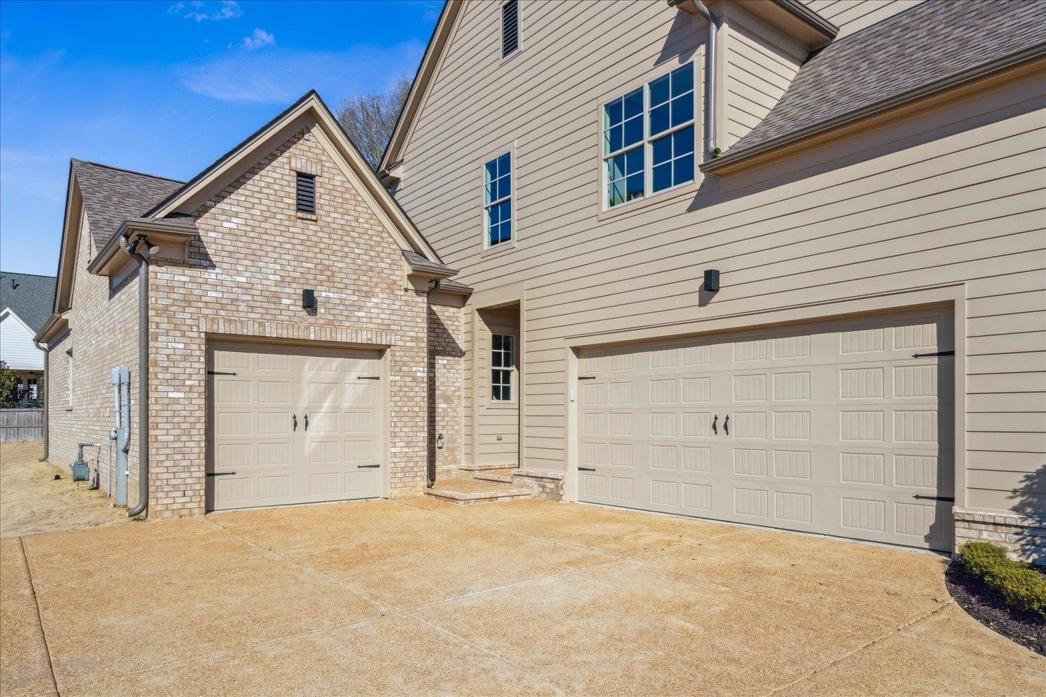 12620 Miss Cloud Road Collierville, TN 38017 - Photo 5 of 38 View of front facade with a garage