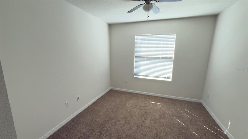 1881 Hovenweep Road Wesley Chapel, FL 33543 - Photo 16 of 18 an empty room with a window