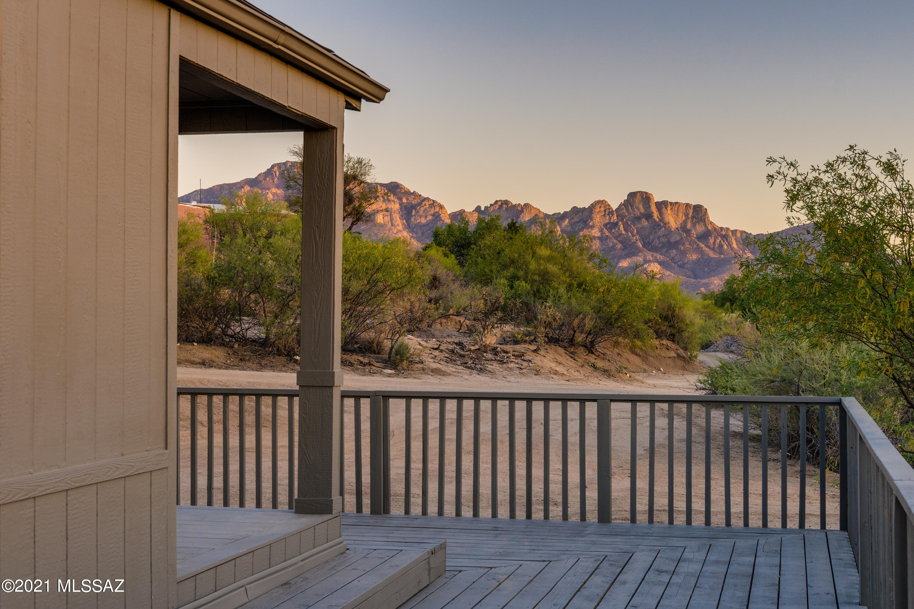 4489 East Wilds Road Tucson, AZ 85739 - Photo 50 of 50 a view of a balcony with wooden fence and floor