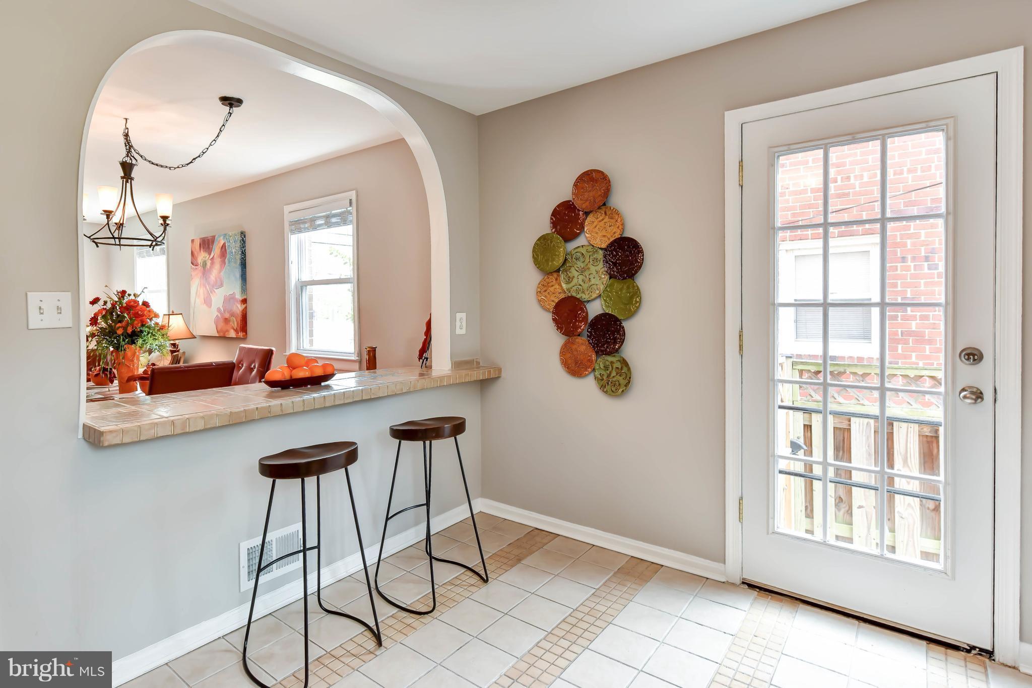704 West Glebe Road Alexandria, VA 22305 - Photo 8 of 30 Well designed kitchen with patio right outside