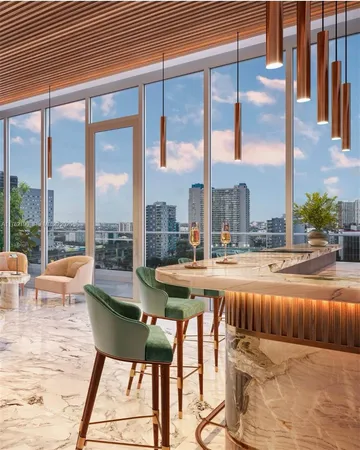 a living room with furniture and a floor to ceiling window