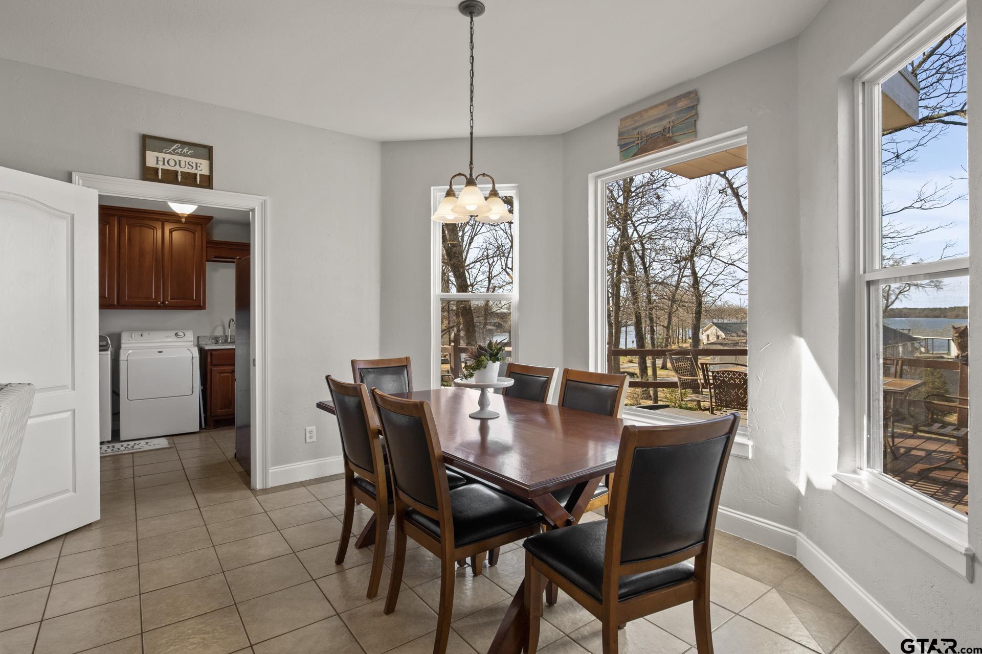 59 Private Road Pittsburg, TX 75686 - Photo 11 of 45 a view of a dining room with furniture window and outside view
