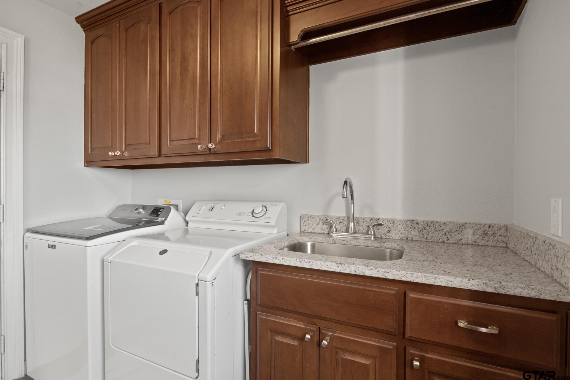 59 Private Road Pittsburg, TX 75686 - Photo 25 of 45 a utility room with a sink washer and dryer