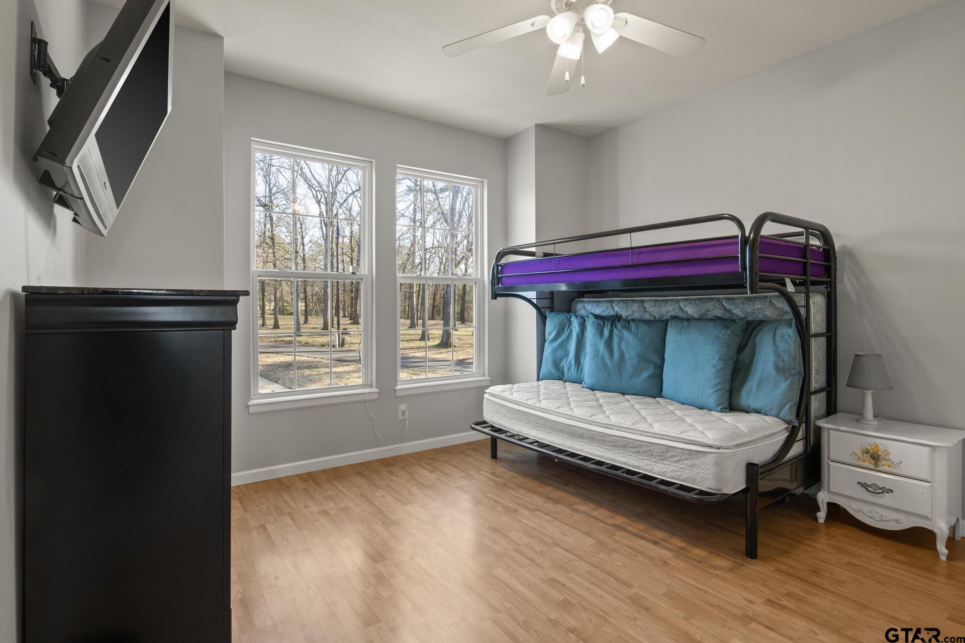 59 Private Road Pittsburg, TX 75686 - Photo 31 of 45 a bedroom with a bed and a window