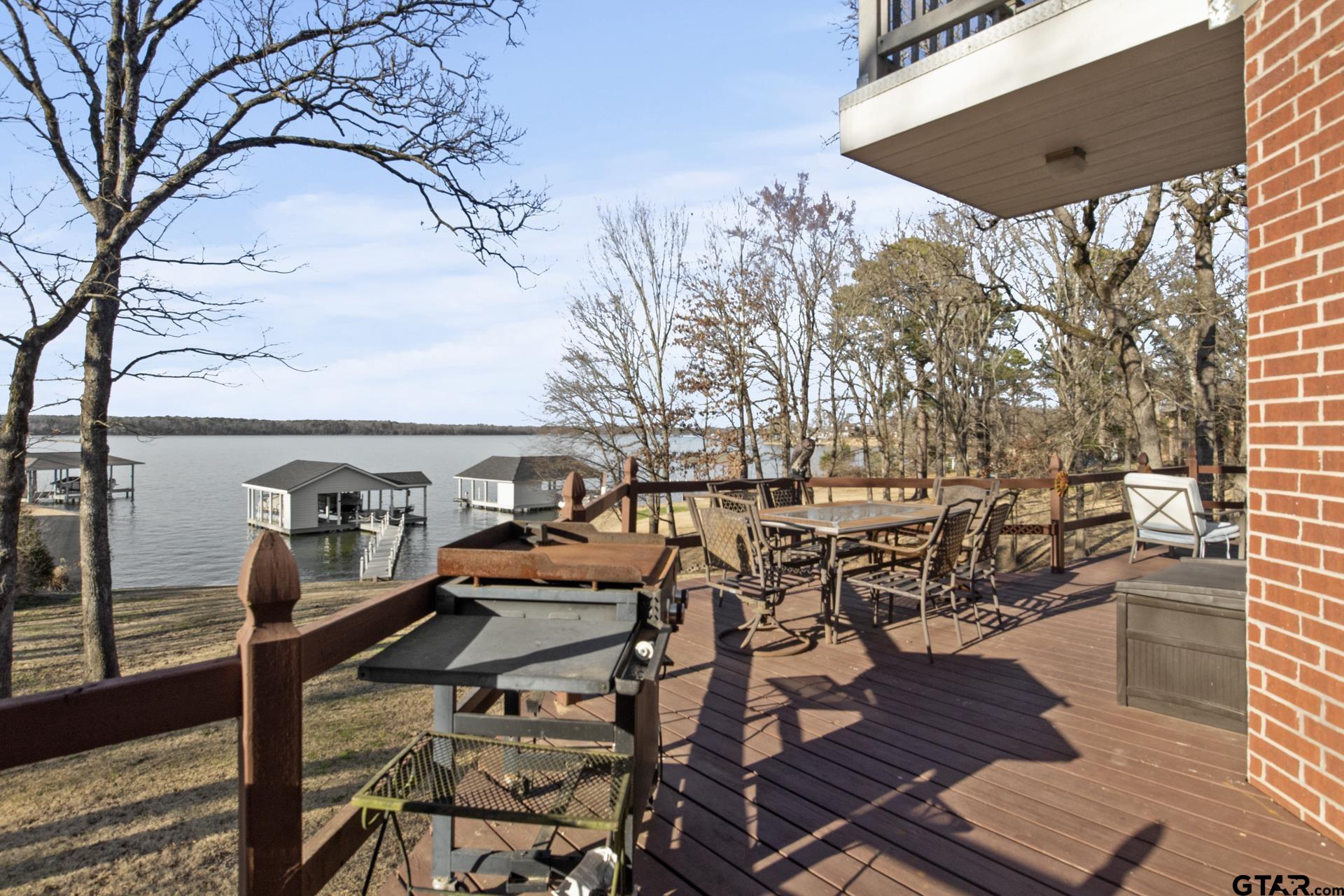59 Private Road Pittsburg, TX 75686 - Photo 34 of 45 a view of a chairs and table on the terrace