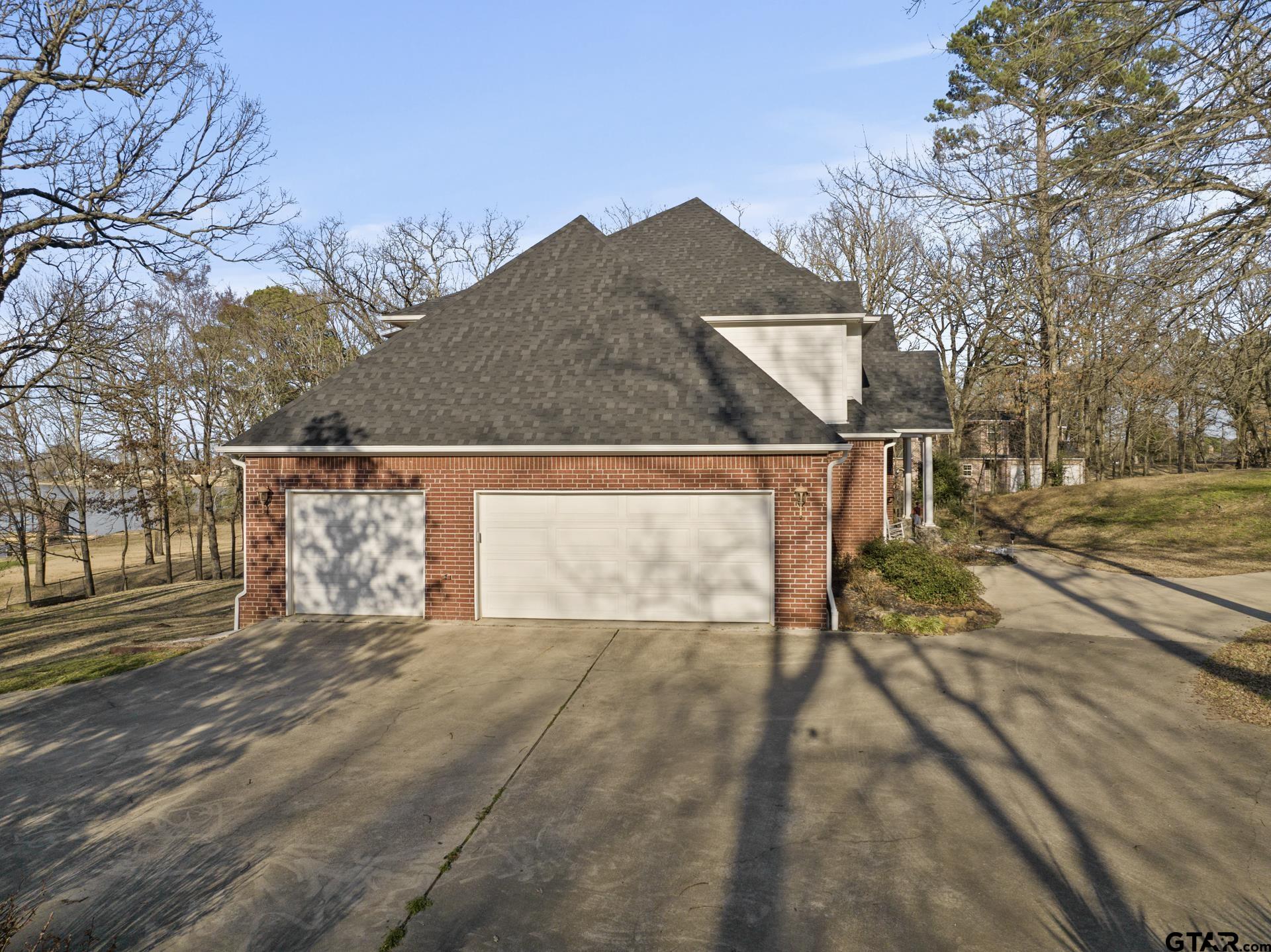 59 Private Road Pittsburg, TX 75686 - Photo 35 of 45 a view of a street with a building in the background