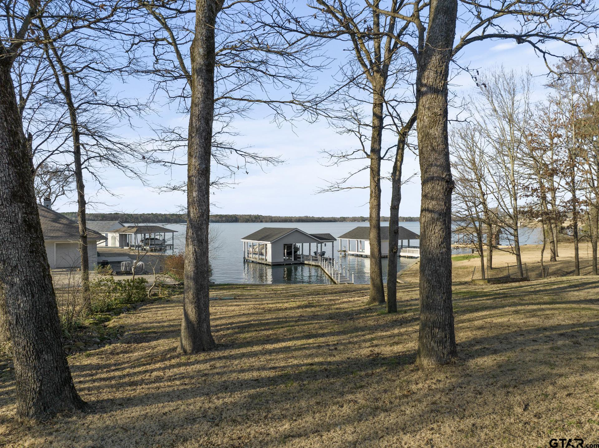 59 Private Road Pittsburg, TX 75686 - Photo 36 of 45 a view of a yard with large tree