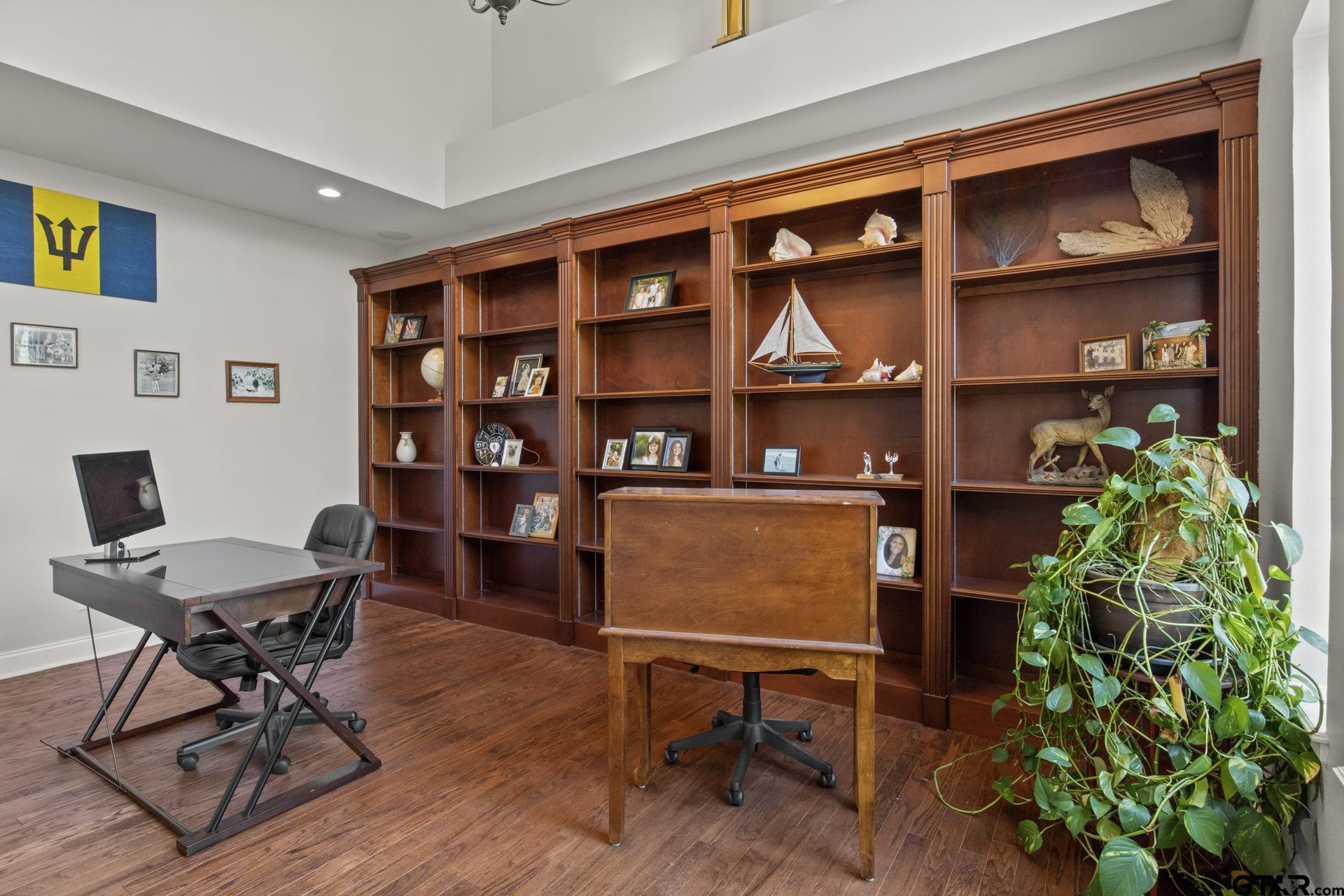 59 Private Road Pittsburg, TX 75686 - Photo 4 of 45 a workspace with furniture bookshelf and a window