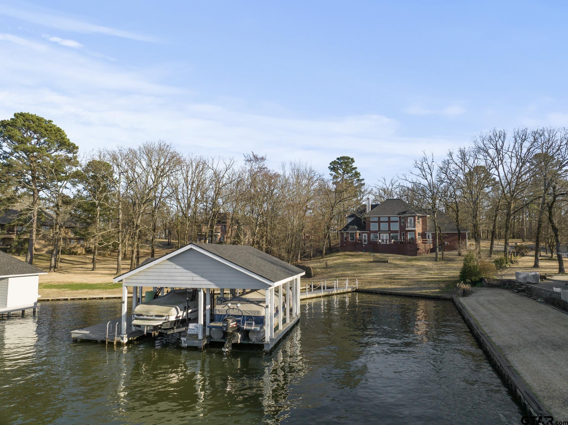 59 Private Road Pittsburg, TX 75686 - Photo 41 of 45 a view of a lake with houses