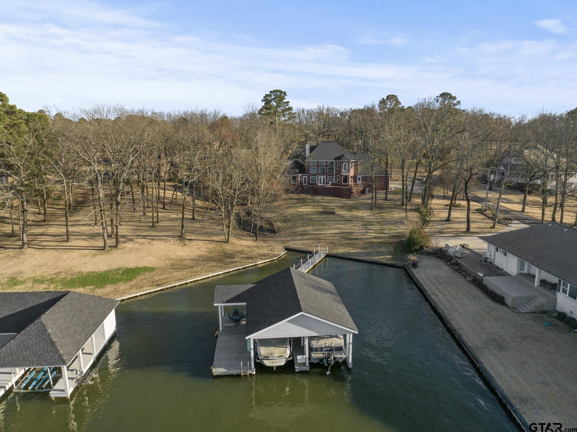 59 Private Road Pittsburg, TX 75686 - Photo 42 of 45 a view of a swimming pool with a terrace