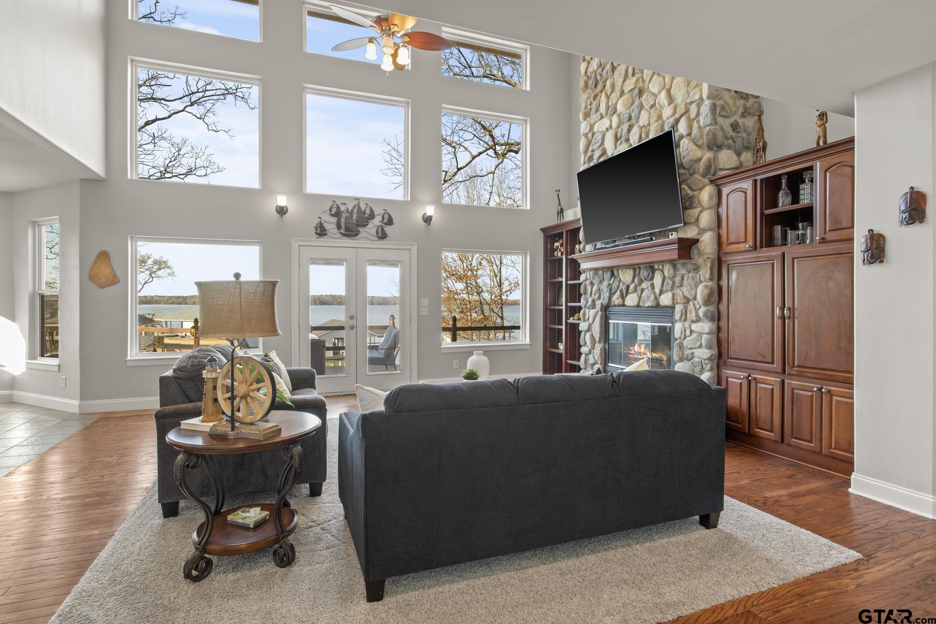 59 Private Road Pittsburg, TX 75686 - Photo 5 of 45 a living room with furniture and a flat screen tv