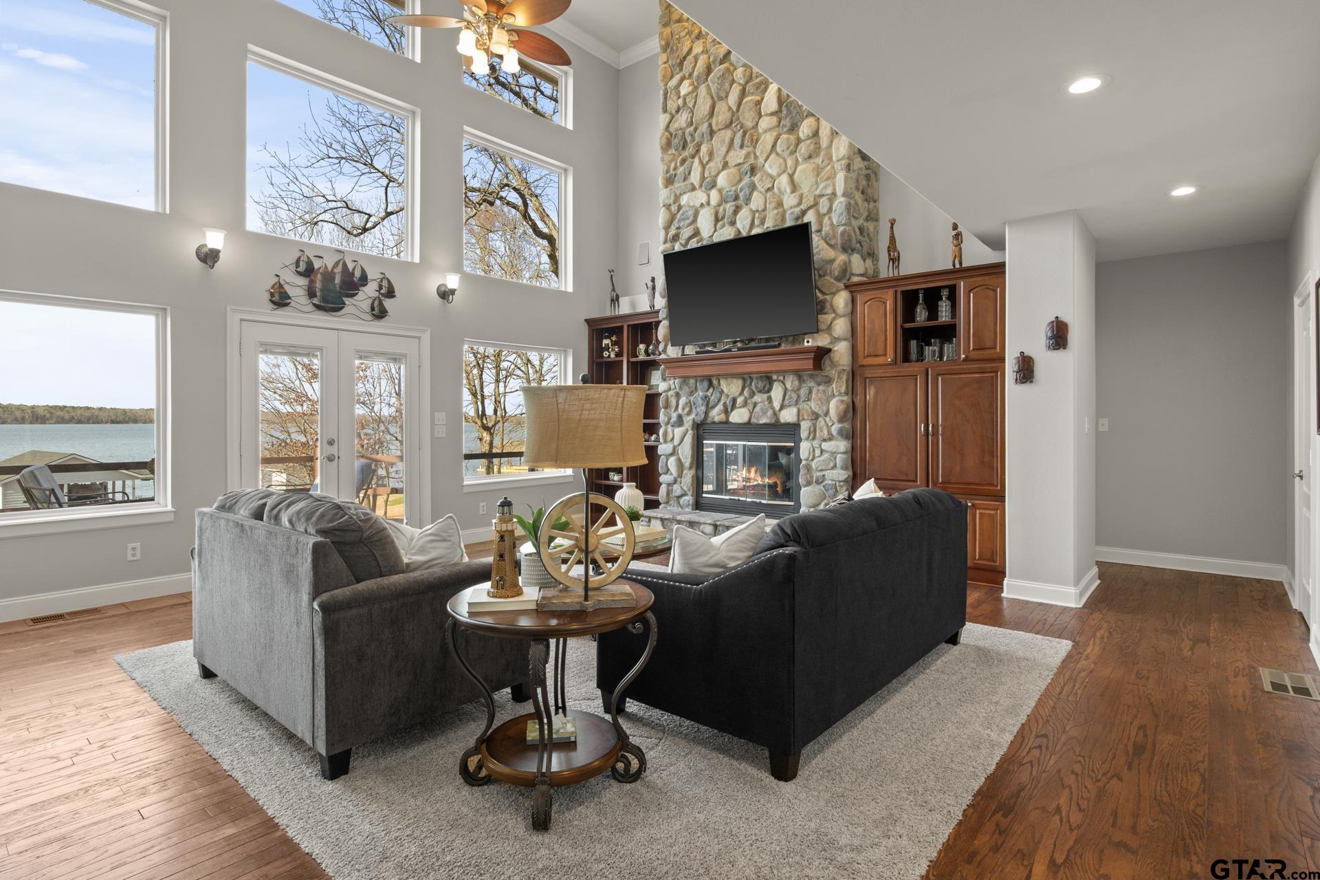 59 Private Road Pittsburg, TX 75686 - Photo 6 of 45 a living room with fireplace furniture and a flat screen tv