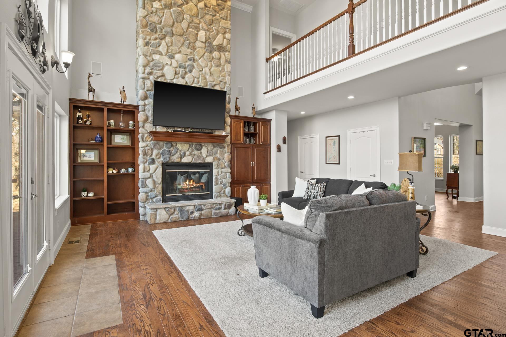 59 Private Road Pittsburg, TX 75686 - Photo 7 of 45 a living room with furniture and a fireplace