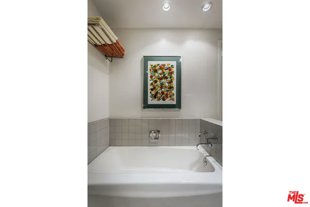 a view of a balcony with chairs