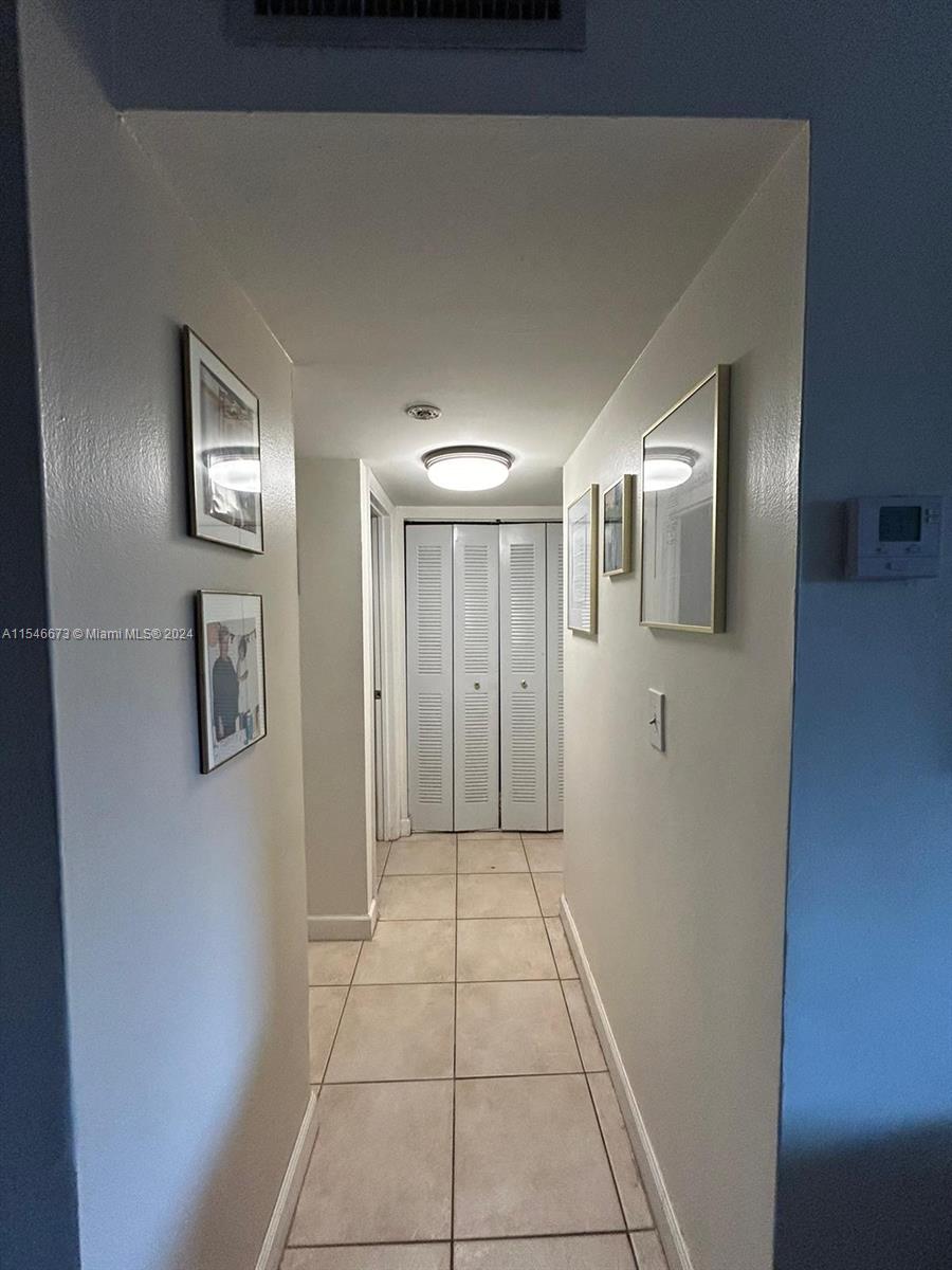8550 Southwest 109th Avenue, Unit 5119 Miami, FL 33173 - Photo 2 of 14 a view of a hallway