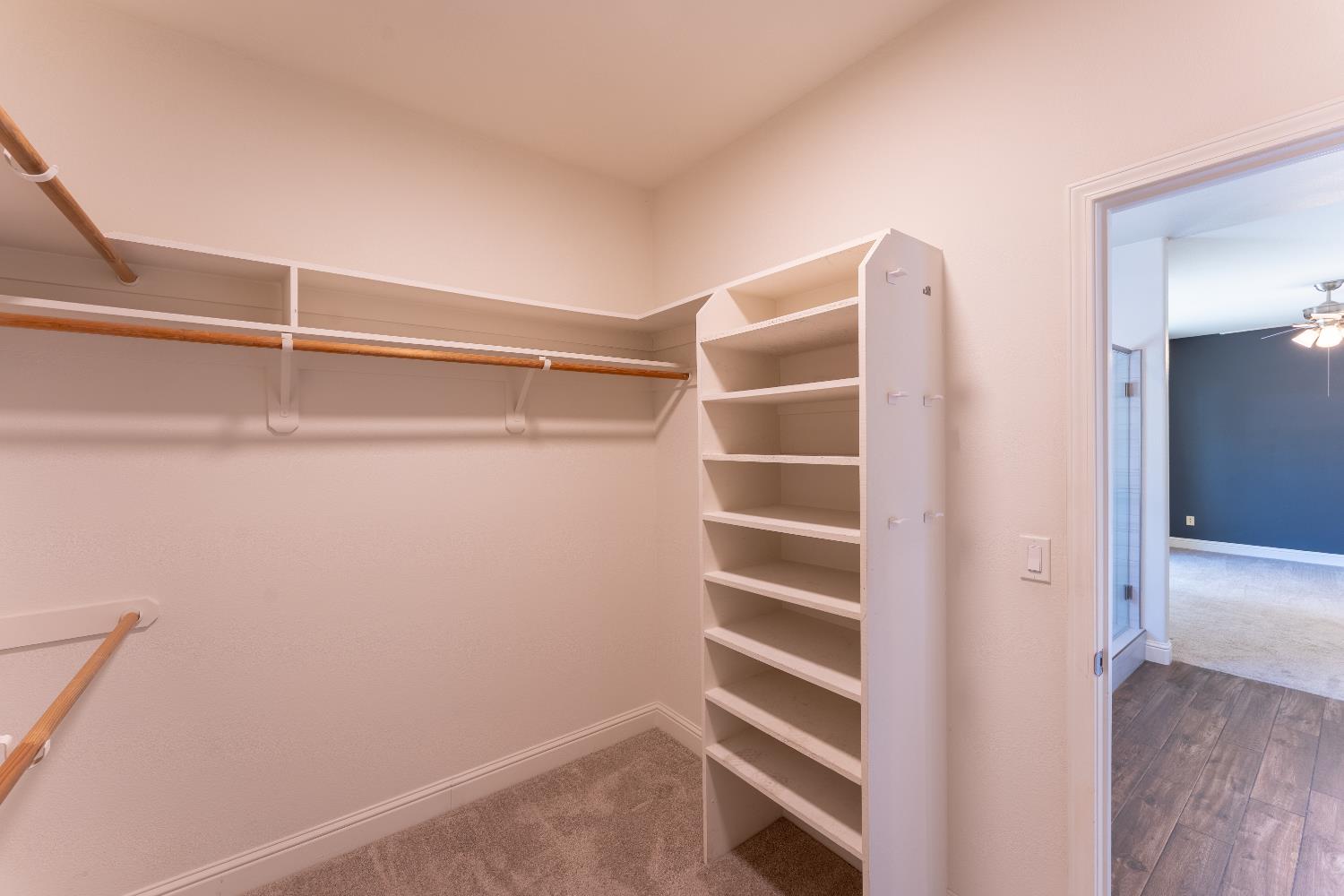 1963 Rialto Court Clovis, CA 93611 - Photo 28 of 36 a view of walk in closet with empty racks
