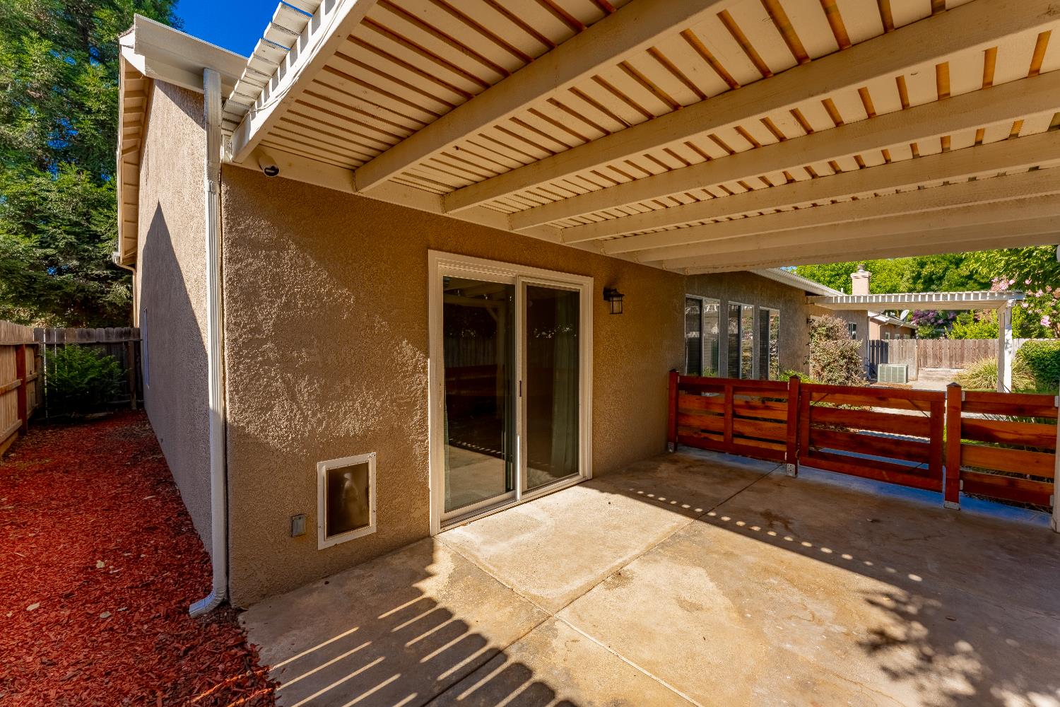 1963 Rialto Court Clovis, CA 93611 - Photo 30 of 36 a view of a patio with wooden floor and roof