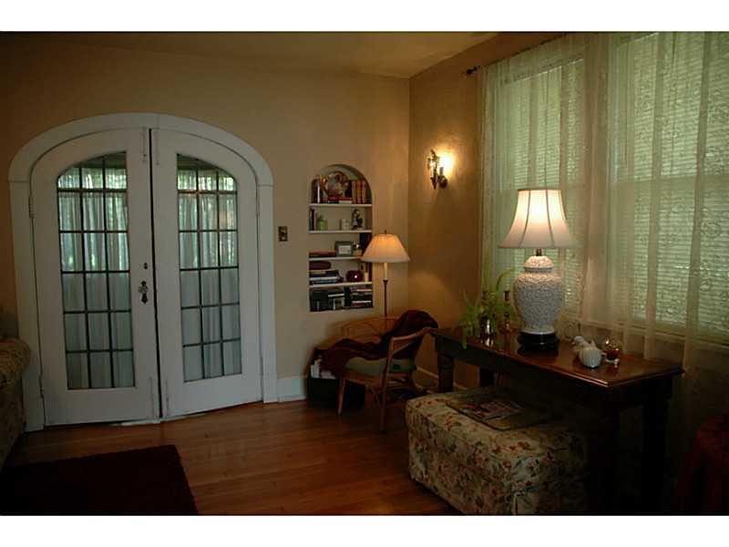 1565 Anderson Road Pittsburgh, PA 15209 - Photo 5 of 22 Living Room. Arched doorways are one of the many unique characteristics of this home.
