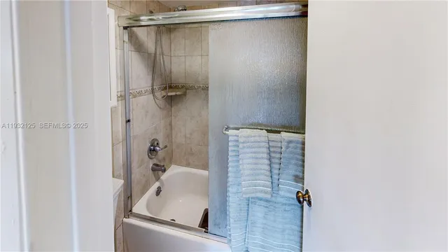 a view of a balcony with wooden floor