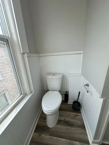 a bathroom with a sink a mirror and vanity