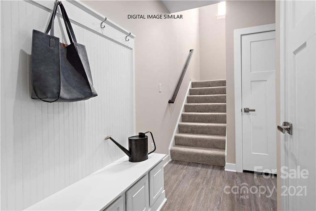 1619 Moore Farm Road, Unit 184 Indian Trail, NC 28079 - Photo 17 of 28 a view of a walk in closet