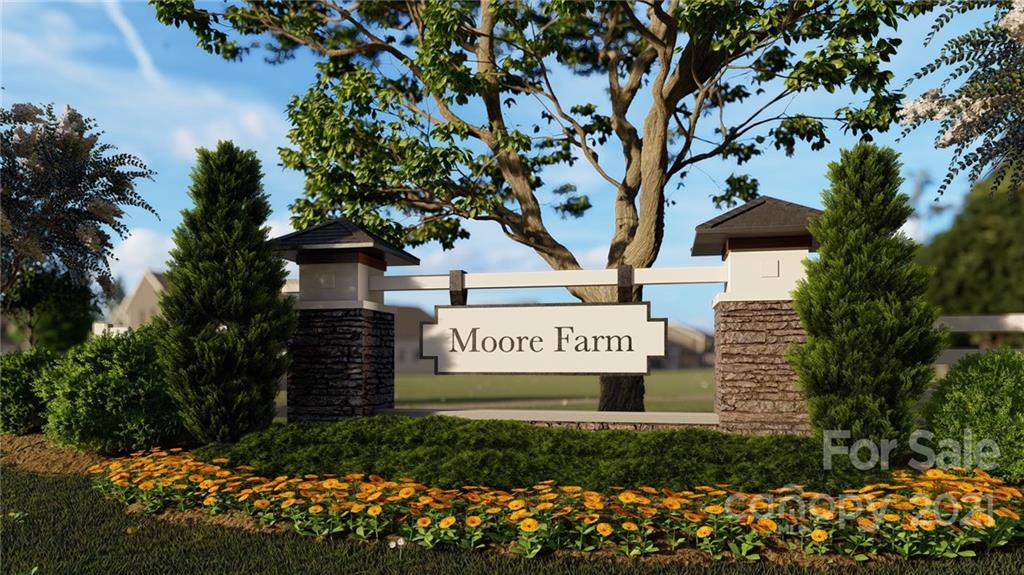 1619 Moore Farm Road, Unit 184 Indian Trail, NC 28079 - Photo 22 of 28 a sign on the side of a building