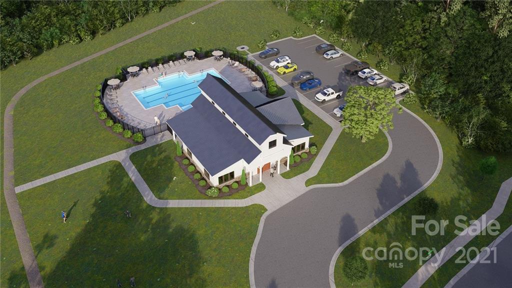 1619 Moore Farm Road, Unit 184 Indian Trail, NC 28079 - Photo 23 of 28 an aerial view of a house a yard and a swimming pool