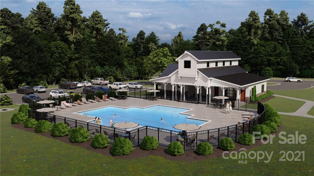 1619 Moore Farm Road, Unit 184 Indian Trail, NC 28079 - Photo 25 of 28 a aerial view of a house with garden space and sitting area