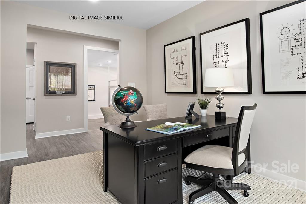 1619 Moore Farm Road, Unit 184 Indian Trail, NC 28079 - Photo 4 of 28 a view of a workspace with furniture