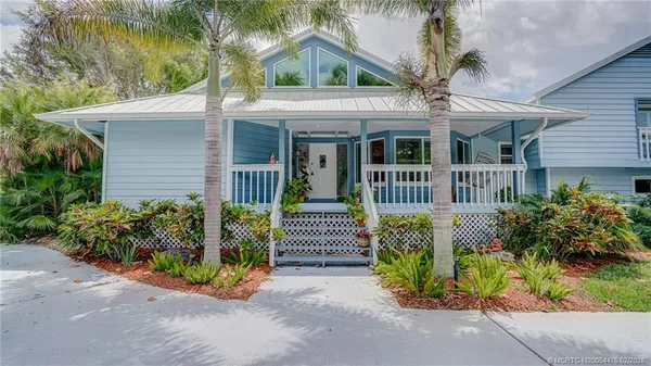 front view of a house with a small yard