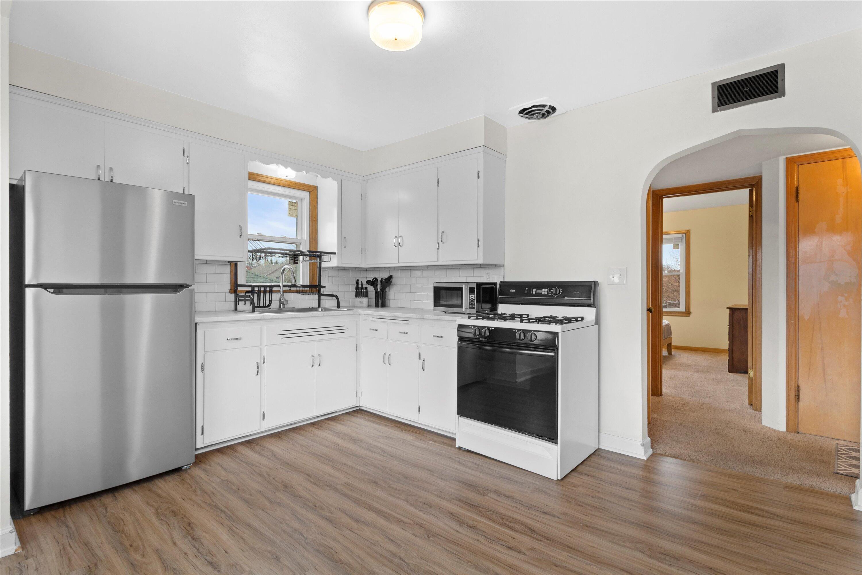 3914 West Scott Street, Unit 3916 West Milwaukee, WI 53215 - Photo 8 of 21 Upper Kitchen