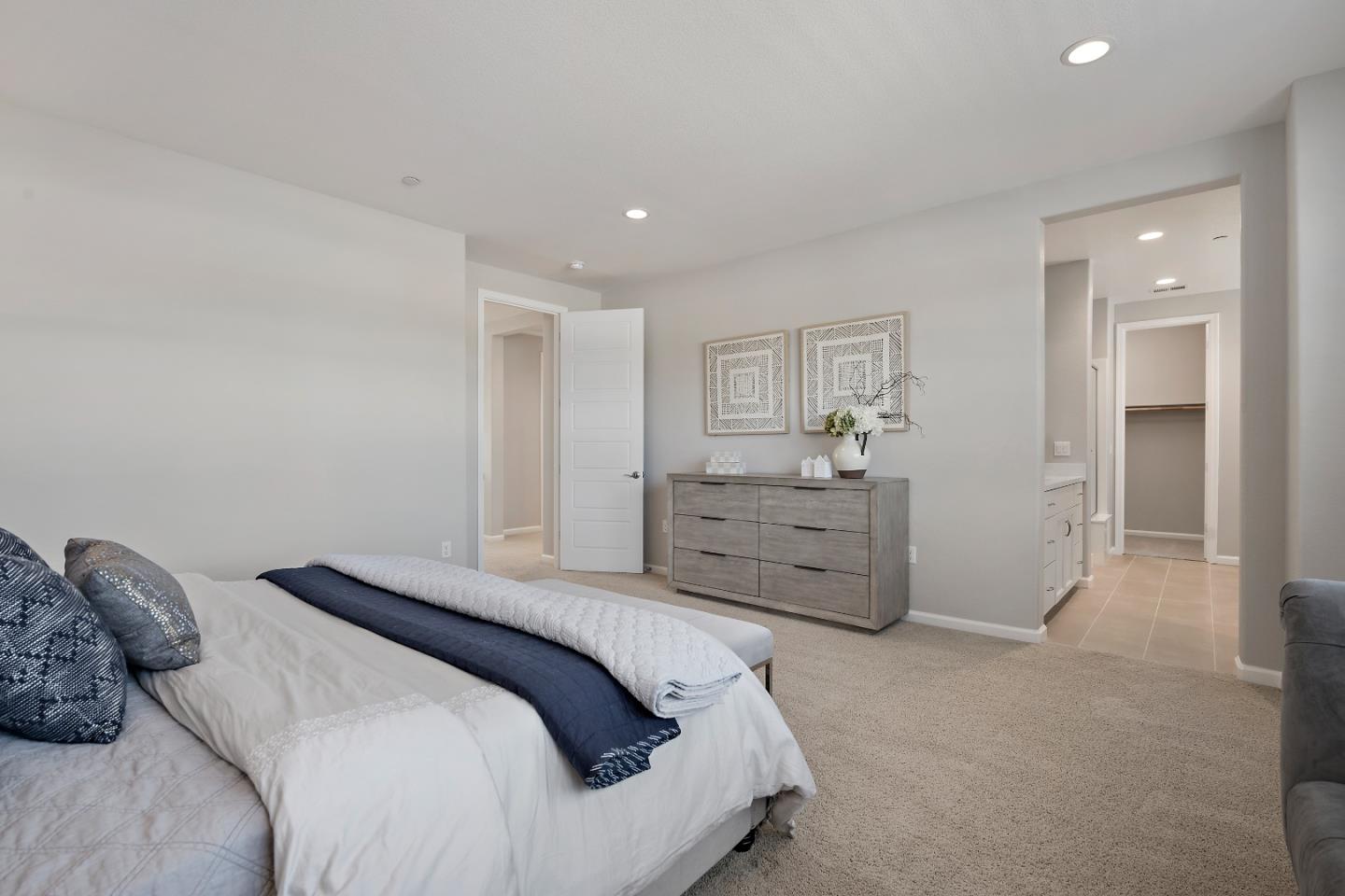 5010 Brook Valley Loop San Jose, CA 95136 - Photo 13 of 24 a bedroom with a bed and a couch