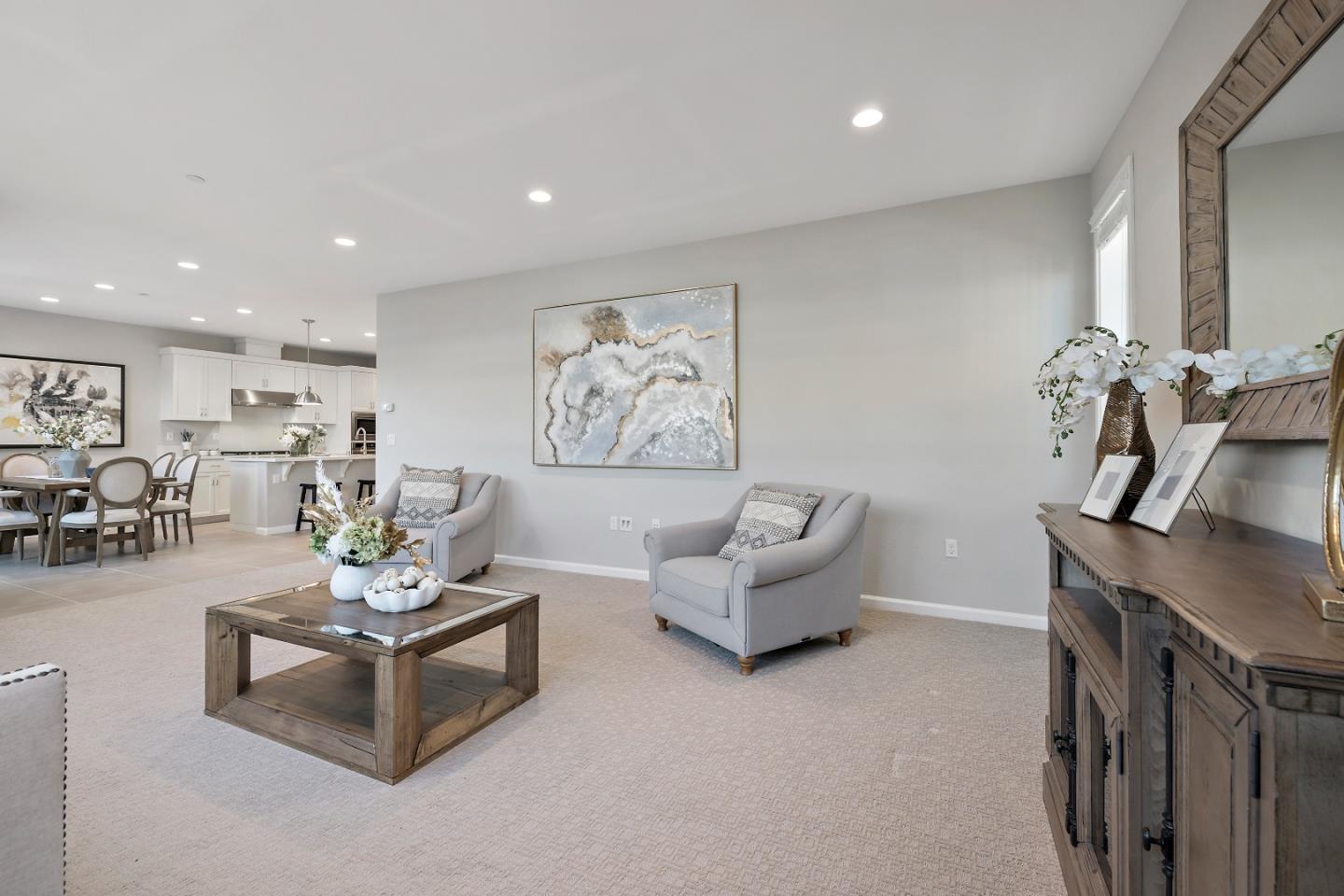 5010 Brook Valley Loop San Jose, CA 95136 - Photo 4 of 24 a living room with furniture and a flat screen tv