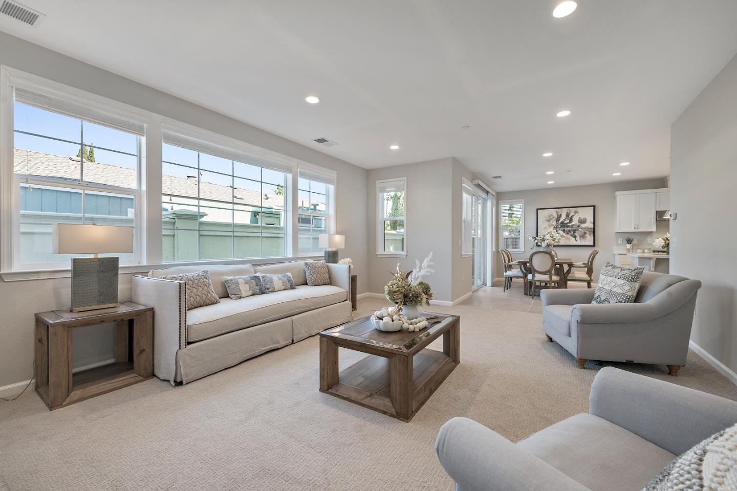 5010 Brook Valley Loop San Jose, CA 95136 - Photo 5 of 24 a living room with furniture and a large window