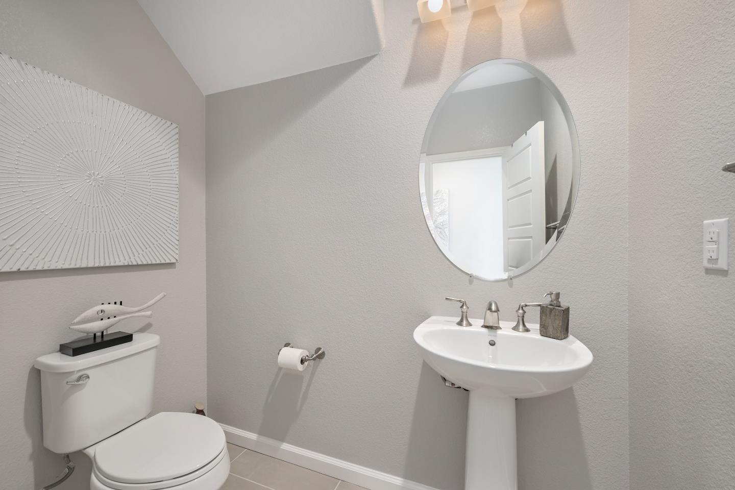 5010 Brook Valley Loop San Jose, CA 95136 - Photo 10 of 24 a bathroom with a toilet sink and mirror