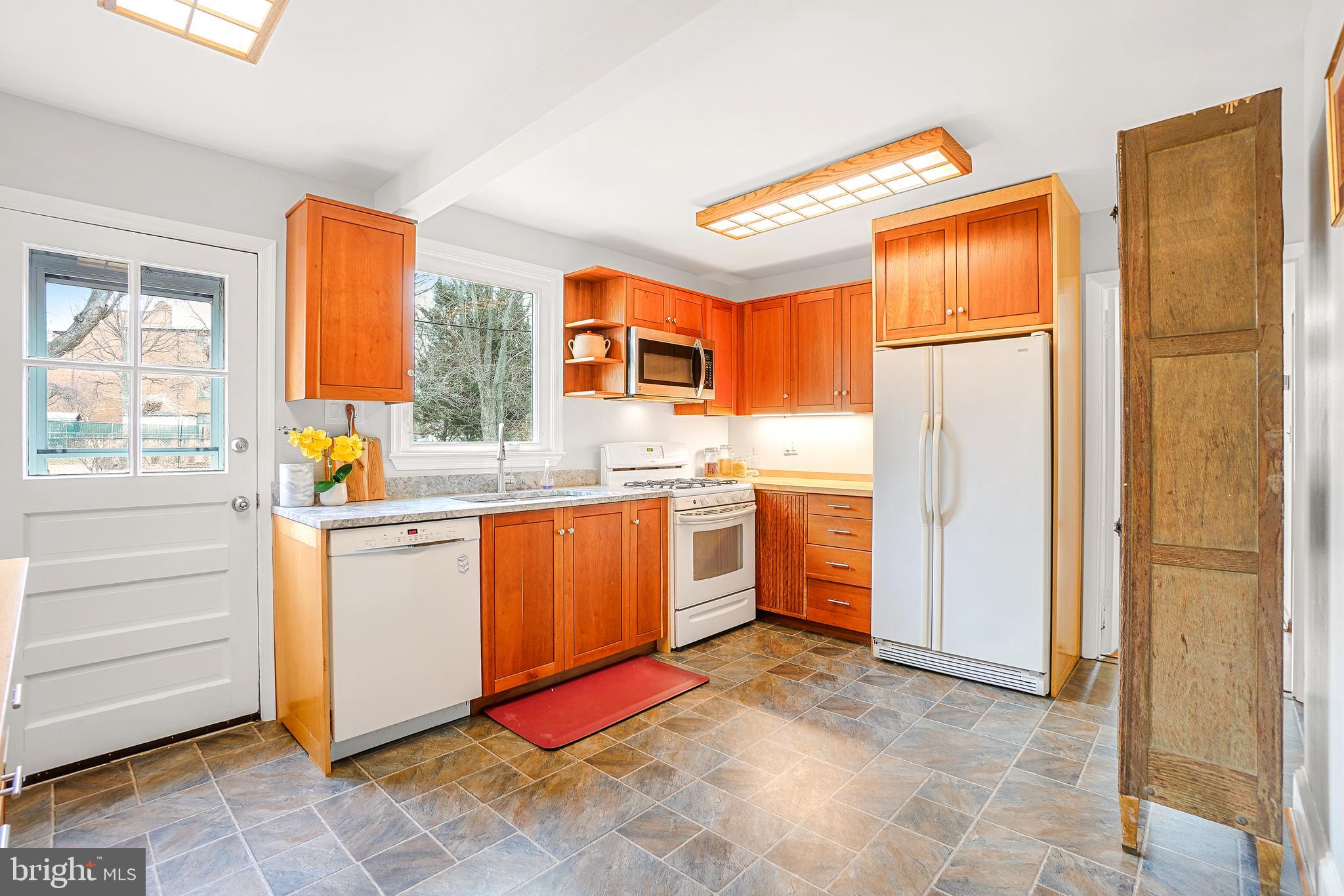 713 Ritchie Avenue Silver Spring, MD 20910 - Photo 13 of 35 Kitchen with Handsome Cabinetry