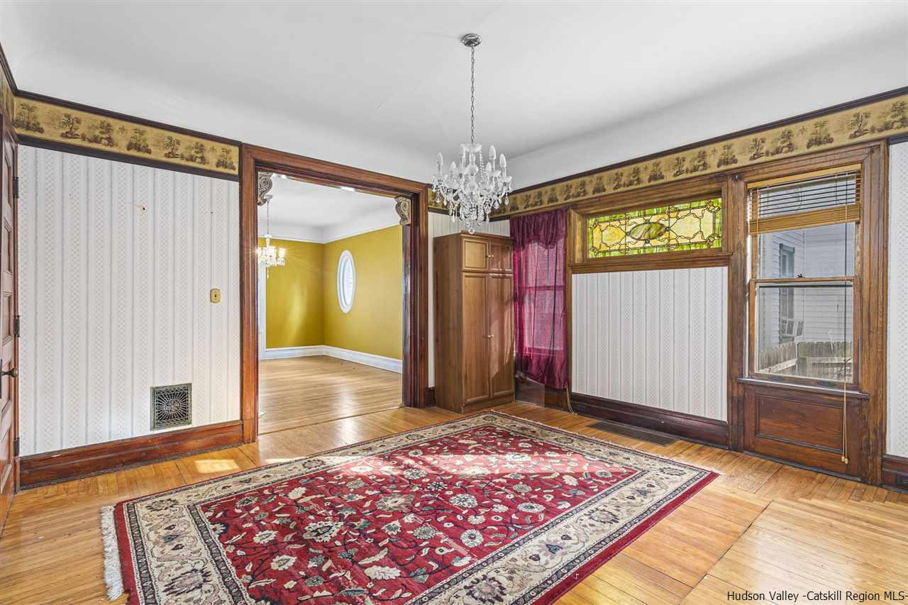 Undisclosed Address Kingston, NY 12401 - Photo 20 of 34 a view of a hallway with furniture and window