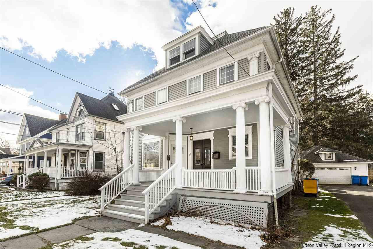 Undisclosed Address Kingston, NY 12401 - Photo 2 of 34 a front view of a house with a yard