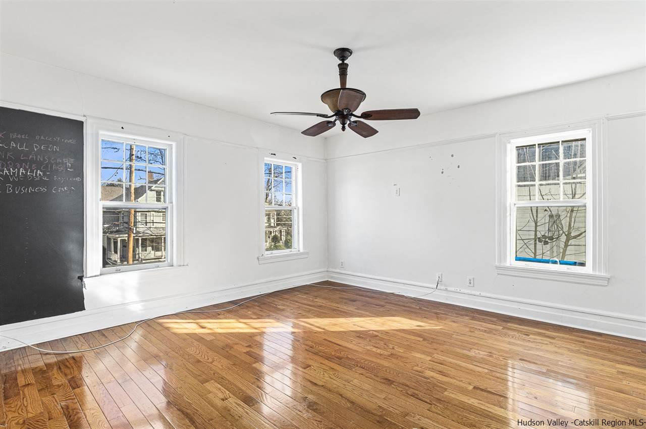 Undisclosed Address Kingston, NY 12401 - Photo 27 of 34 a view of an empty room with a window and wooden floor