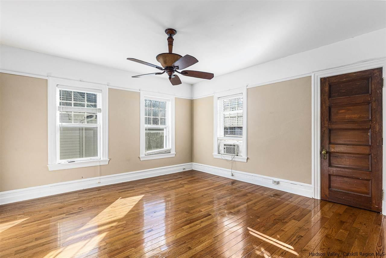Undisclosed Address Kingston, NY 12401 - Photo 28 of 34 a view of an empty room with a window and wooden floor