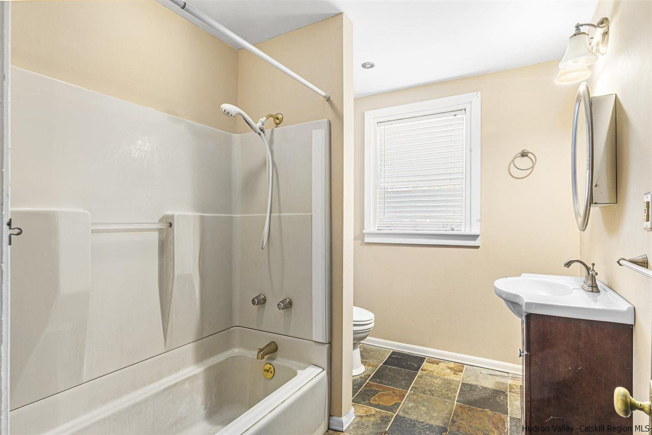 Undisclosed Address Kingston, NY 12401 - Photo 29 of 34 a bathroom with a sink a toilet and shower