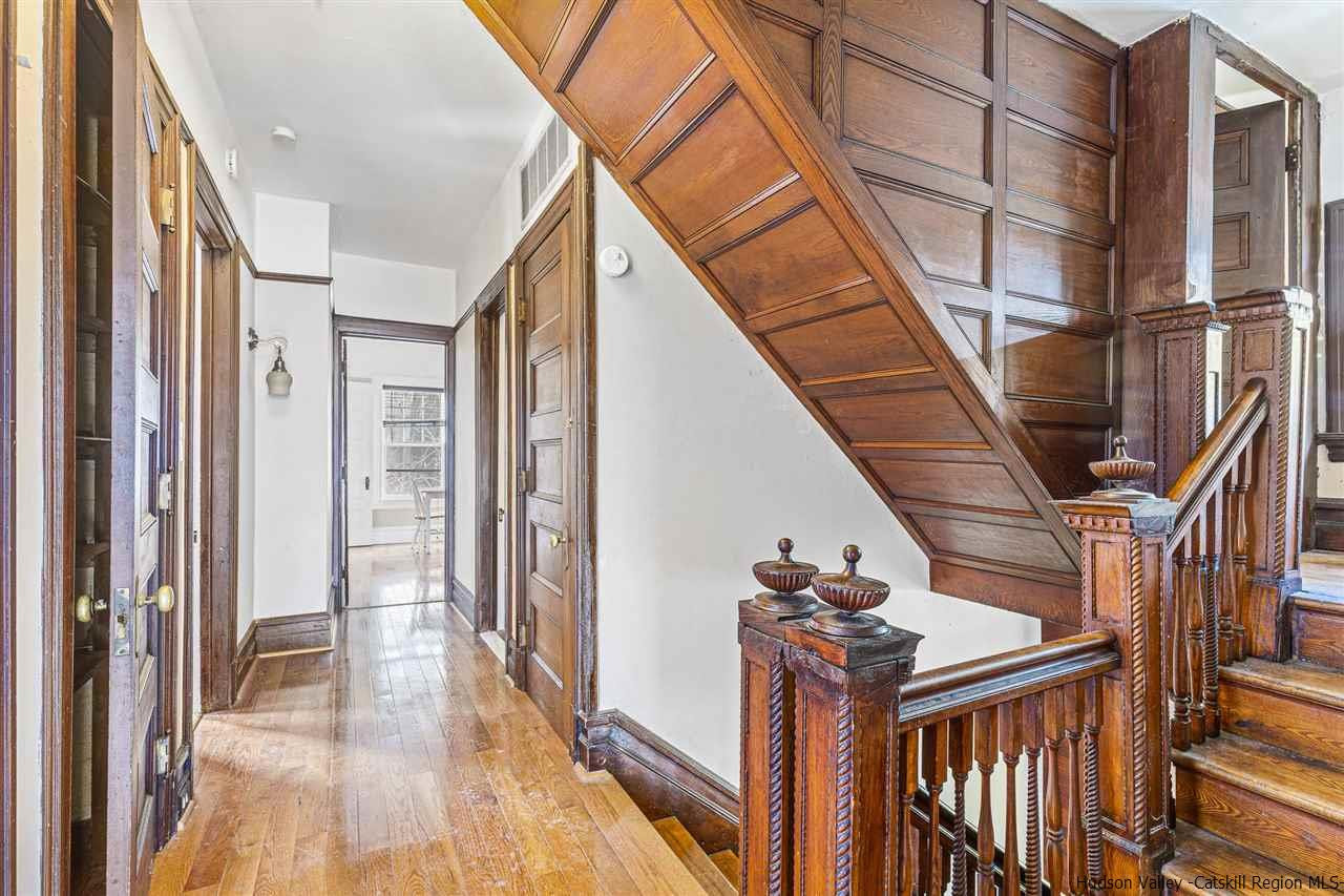 Undisclosed Address Kingston, NY 12401 - Photo 31 of 34 a view of hallway with wooden floor and stairs